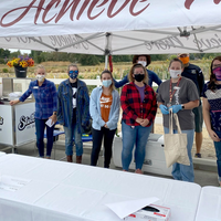 Farm to Fork volunteers helped distribute food to participants at the Campus Garden