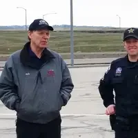 CWI students in the port of entry talking with officers