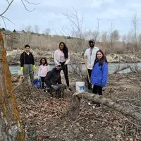 Volunteers working along river