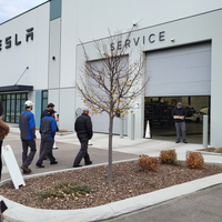 Students visiting Tesla Service Center