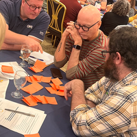 Guests attend a faculty professional development event. 