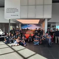 Group of people posing and looking at the camera