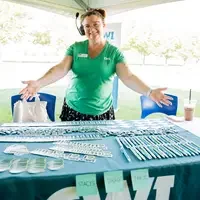 Faculty and staff from a college attend and annual event.