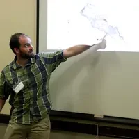 College of Western Idaho student Austin Madsen speaks during a science symposium at Boise State University on Aug. 11. 