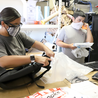 Marisa Zazveta and Freddy Anzaldua complete an order on Sept. 3 at CWI's Bookstore.