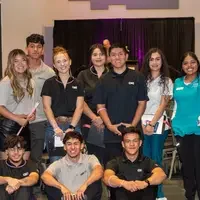 CWI students posing for picture at event