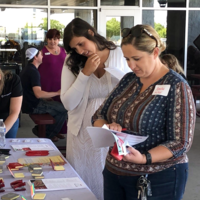 Students attending barbecue hosted by Saint Alphonsus Aug. 27, 2019