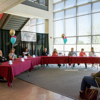 Local medical professionals engage in a panel discussion hosted by the Medical Professionals Club
