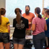 Evan Worthington, from the Bureau of Land Management, with Adventure Club participants