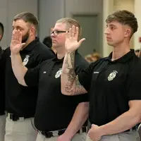 Law Enforcement students celebrate graduation with family and friends during a ceremony on May 16.