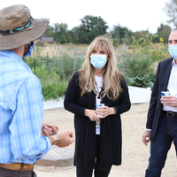 Participants taking a tour of the Campus Garden