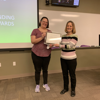 Cathy Carson receiving an award