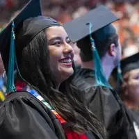Smiling graduate at commencement