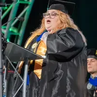 Student speaking at graduation 