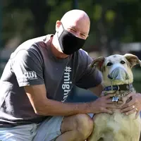 Marketing and Communication instructor, Dan Garrity, and his dog at the Ada County Campus Pintail Center