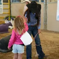 Kid and woman high fiving