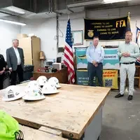 Leaders address students at an event.
