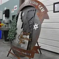 Metal Christmas tree, Idaho, and Snowflake artwork for Capital Christmas Tree