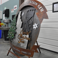 Metal Christmas tree, Idaho, and Snowflake artwork for Capital Christmas Tree