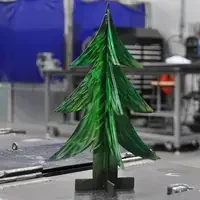 CWI faculty created table-top metal Christmas trees for display at the lighting ceremony.