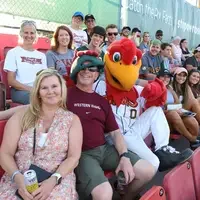 CWI Employee, Mark Westcott, and his wife enjoying the game from the CWI group section