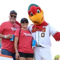 CWI donors posing with Humphrey the Hawk in the CWI group section 