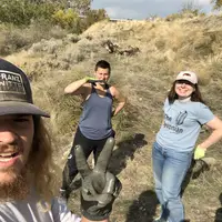 Students posing for a selfie on the land