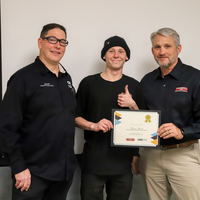 Student and faculty with certificate of completion
