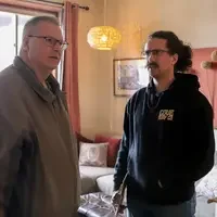 Gary Heller and student disucussing sustainability