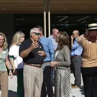 People talking outside at an event