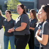Group of students standing outside together