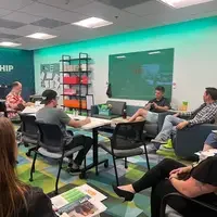 Guest speaker talking with students during workshop