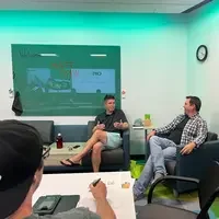 Guest speaker talking with host of workshop