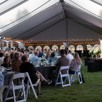 Guests listening to speaker