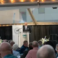 Speaker standing at podium