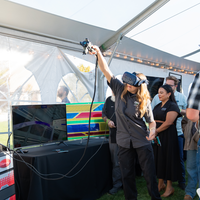 Collision Repair student demonstrating VR equipment