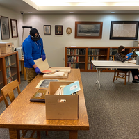 History Capstone class students from CWI searching Idaho State Archives