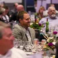 Audience member smiling