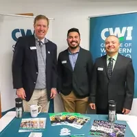 President Gordon Jones, Damian Valle, Luis Caloca standing for a picture