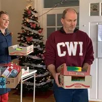 Courtney Santillan and Scott Straub delivering supplies to City Light shelter, Dec. 12. 