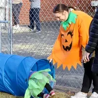 CWI students working with children in tunnel
