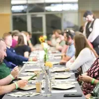 Guests eating at Farm to Form dinner