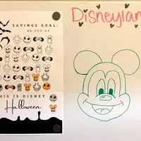A chart featuring Disney characters on a whiteboard.