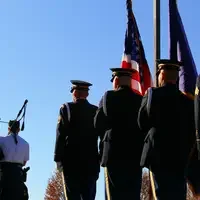 Guest speaker George Nickel with the Wyakin Warrior Foundation, a student speaker, choir, and honor guard