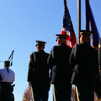 Guest speaker George Nickel with the Wyakin Warrior Foundation, a student speaker, choir, and honor guard