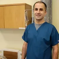 Shahpoor Motawakil posing for a picture