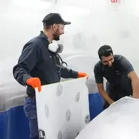Students working on a car