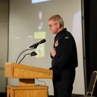 Darrin Raskopf speaking at ceremony