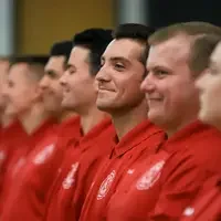 Fire student listening to ceremony speakers