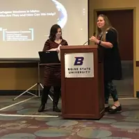 Katie Price, Outreach Enrollment Advisor, and Erica Compton, Advising and New Student Services Manager, presenting at the Inclus